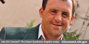 smiling male and text below of: Join DS-Connect<sup>®</sup>: The Down Syndrome Registry today. DSconnect.nih.gov. Click to open image in a larger size in a new tab.